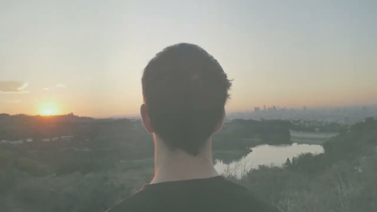 Book trailer thumbnail showing apocalyptic revelation scene with hopeful light