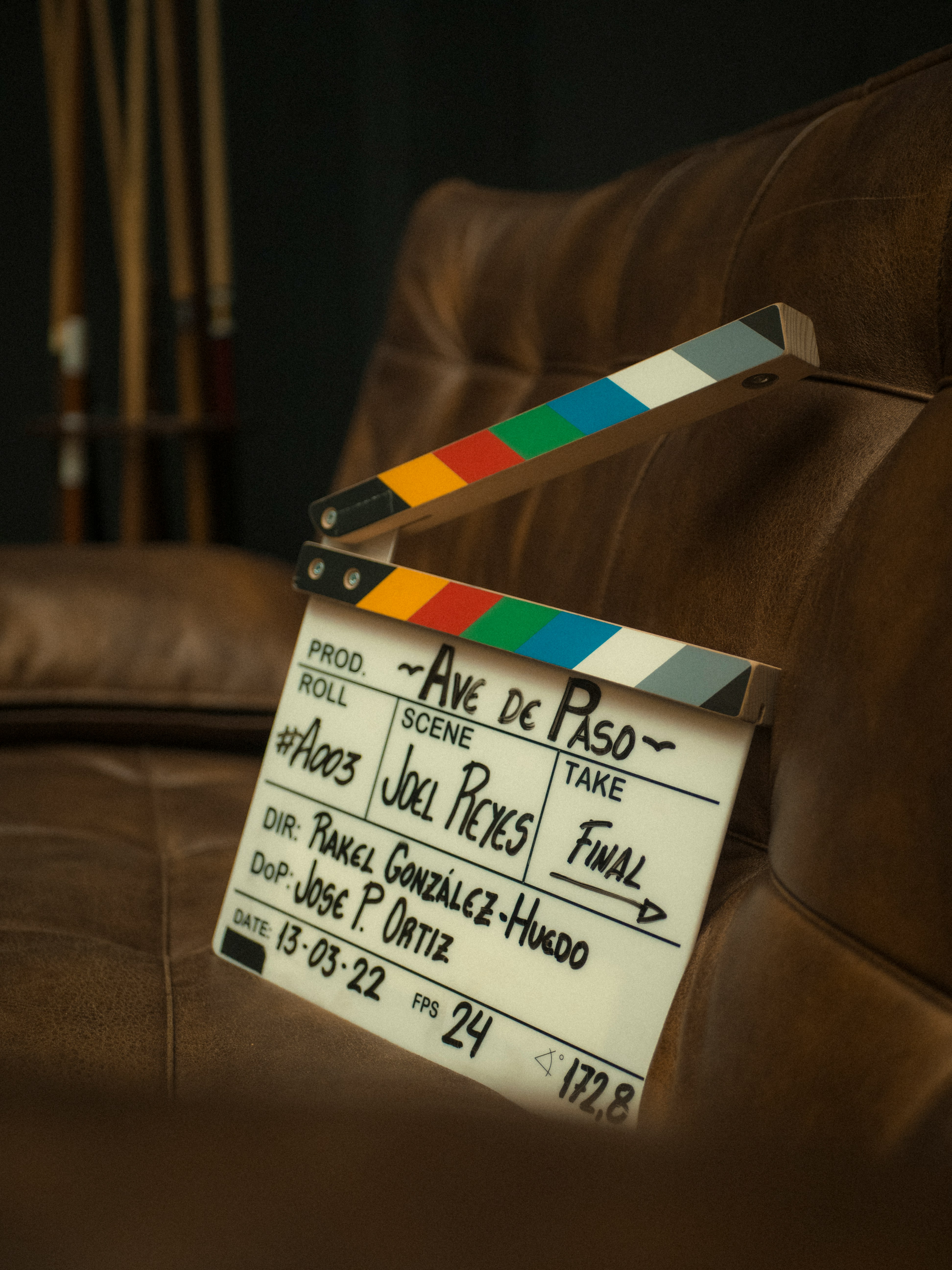 Camera team filming an emotional scene on a designed set